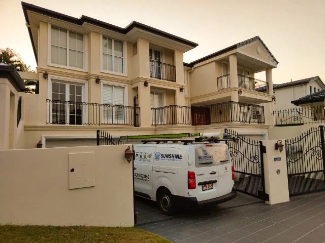 Sunshine Security van parked in the driveway of a Brisbane home